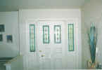 stained beveled leaded sidelites + door panels