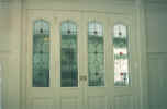 stained leaded + beveled door panels