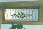 stained, leaded & beveled fixed stair landing window