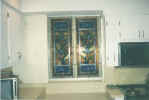 stained leaded by-pass window panels