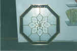 stained & beveled brass octogonal window